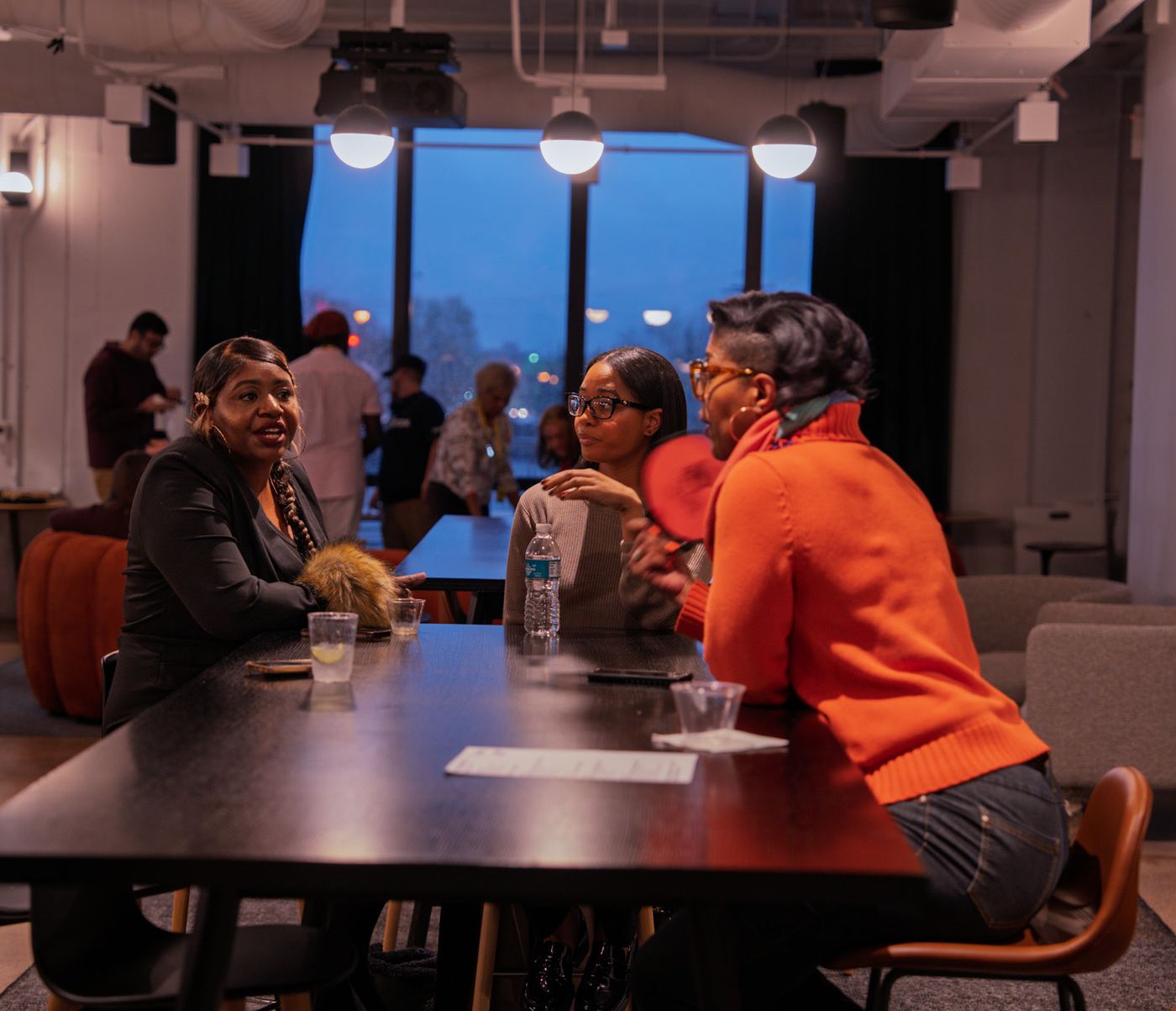 Women talking at an STL TechWeek event